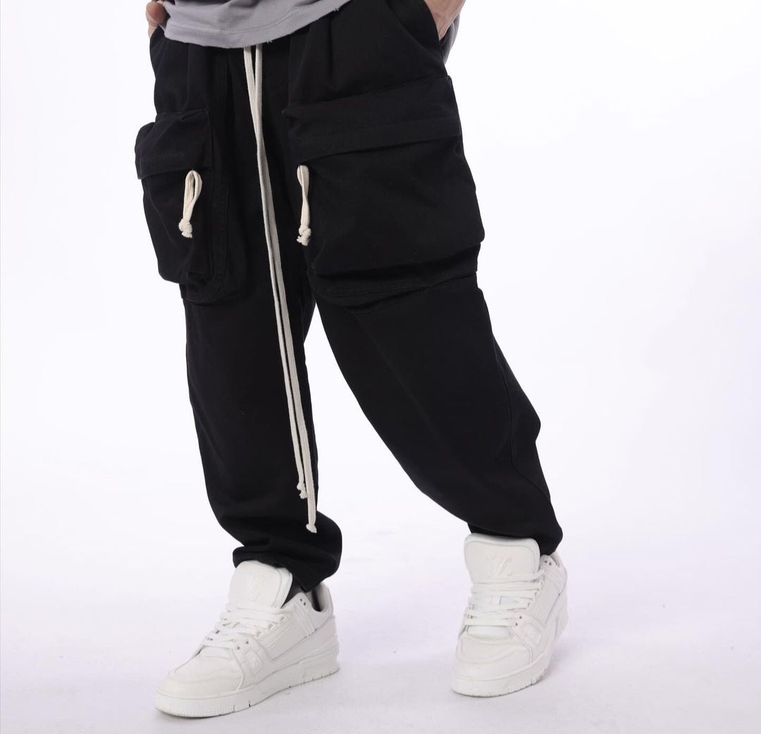 Pantalone Cargo con tasca frontale neri